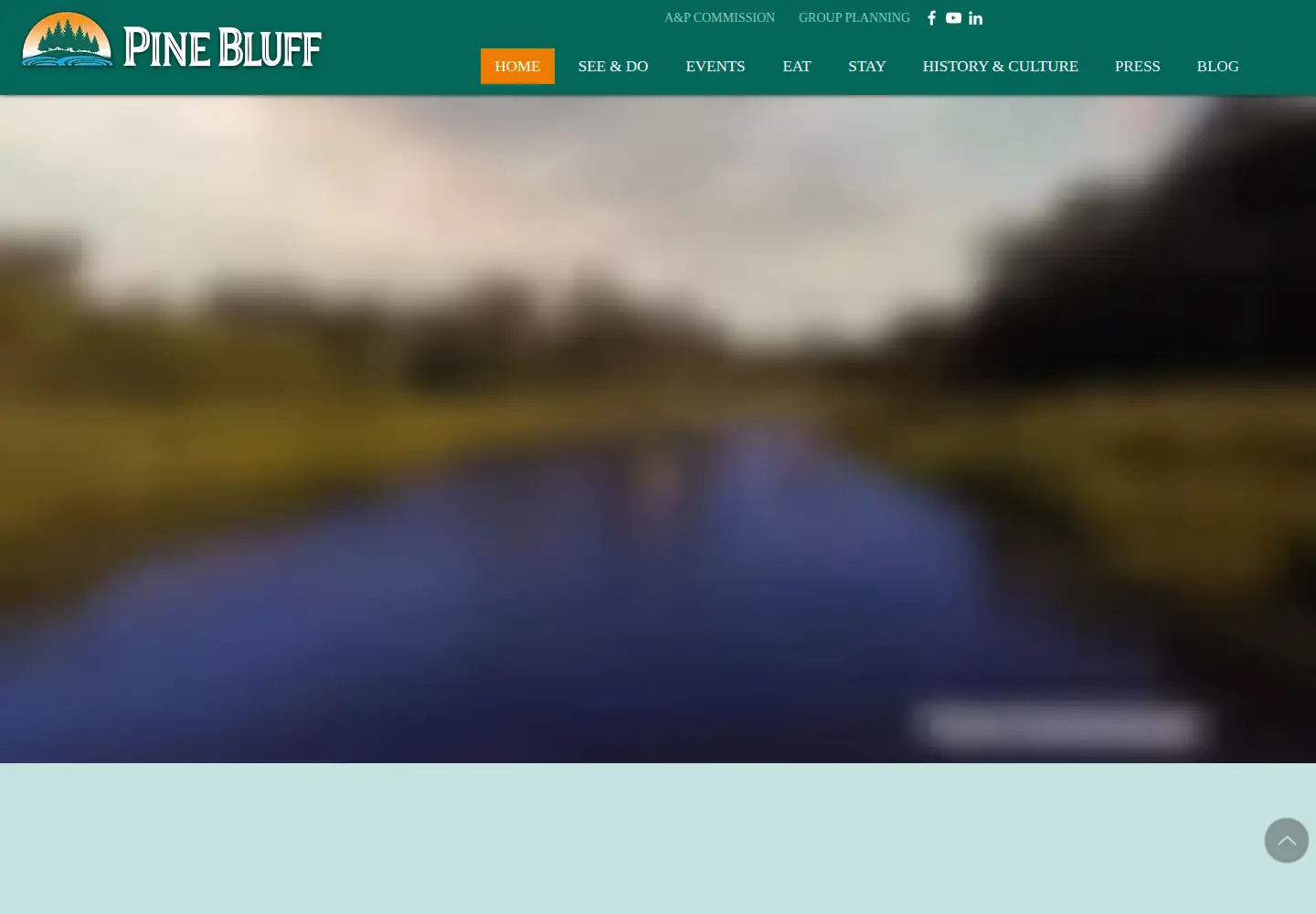 Screenshot of explorepinebluff.com