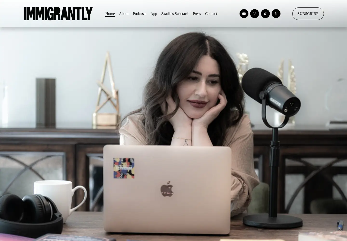 Screenshot of immigrantlypod.com