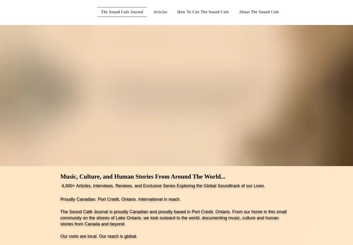Screenshot of thesoundcafe.com
